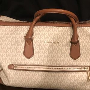 Bag has small black spot on the end and some wear on the inside